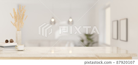 Luxury white granite tabletop with copy space against burred elegance living room 87920107