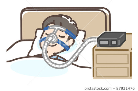 A man sleeping with CPAP A man sleeping with CPAP 87921476