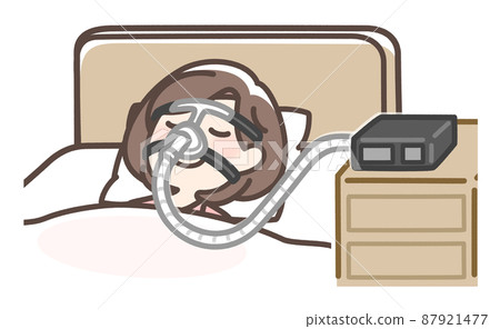 Woman sleeping with CPAP Woman sleeping with CPAP 87921477