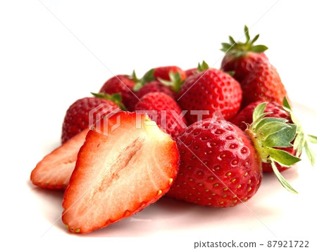 Strawberries served on a white plate 87921722