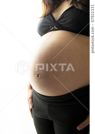 Pregnant woman stomach 87922331