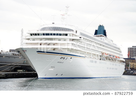 Exterior view of Asuka 2 luxury cruise liner anchored at Osanbashi International Passenger Ship Terminal (Meriken Wharf) in Yokohama Port Exterior view of Asuka 2 luxury cruise liner anchored at Osanbashi International Passenger Ship Terminal (Meriken Wharf) in Yokohama Port 87922759