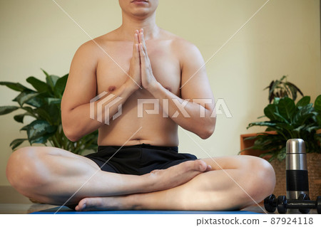 Man Practicing Yoga Man Practicing Yoga 87924118