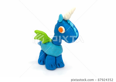 Play plasticine unicorn on white background. Handmade clay plasticine Play plasticine unicorn on white background. Handmade clay plasticine 87924352
