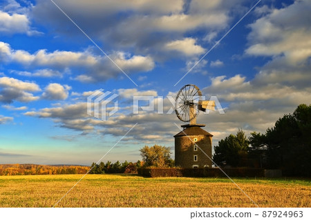 Beautiful old windmill at sunset. Ruprechtov - Czech Republic. Beautiful old windmill at sunset. Ruprechtov - Czech Republic. 87924963