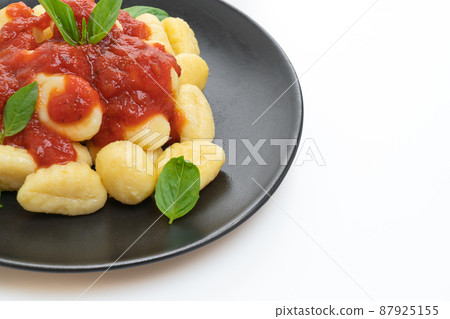 gnocchi in tomato sauce with cheese gnocchi in tomato sauce with cheese 87925155