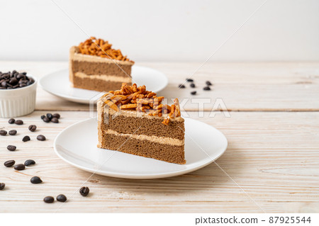 coffee almonds cake on plate 87925544