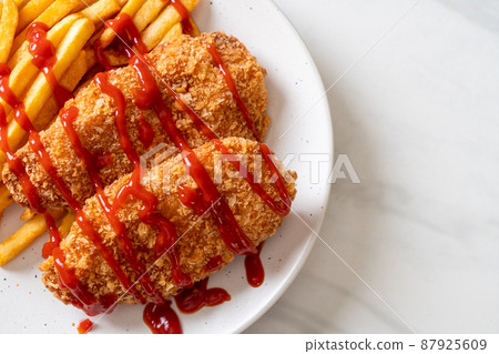 fried chicken breast fillet steak with french fries 87925609