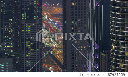 Highway and overpass of Dubai downtown aerial night timelapse. Highway and overpass of Dubai downtown aerial night timelapse. 87925669