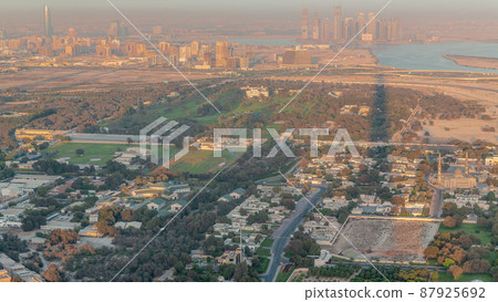 Garden in Zabeel district with skyscrapers on a background aerial timelapse in Dubai, UAE Garden in Zabeel district with skyscrapers on a background aerial timelapse in Dubai, UAE 87925692