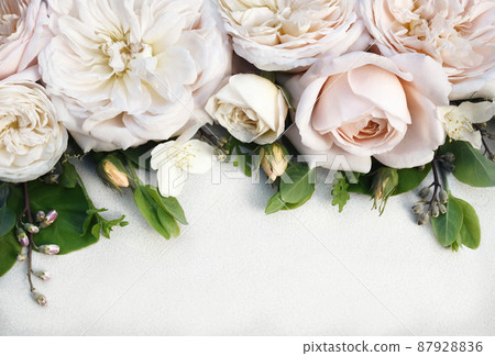 Delicate blooming festive roses and light pink flowers background, blossoming rose flower soft pastel frame, bouquet floral card, selective focus Delicate blooming festive roses and light pink flowers background, blossoming rose flower soft pastel frame, bouquet floral card, selective focus 87928836