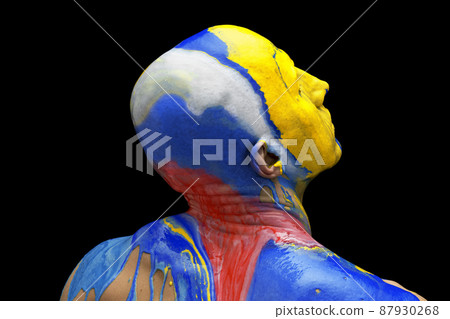 Conceptual image. Male head and shoulders covered with blue, white, red and yellow colors symbolizing russian agression agaist Ukraine. 87930268