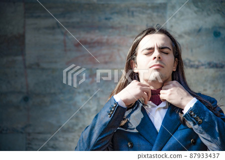very elegant young manager very elegant young manager 87933437