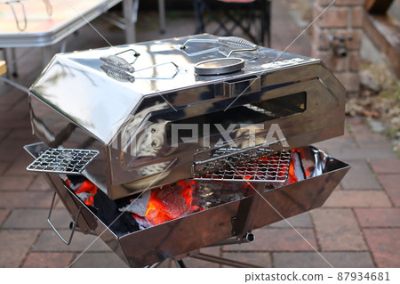 Photo of cooking in a pizza kiln at a camp Photo of cooking in a pizza kiln at a camp 87934681