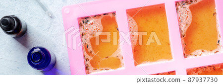 Organic handmade soap, overhead flat lay shot panorama with essential oils Organic handmade soap, overhead flat lay shot panorama with essential oils 87937730