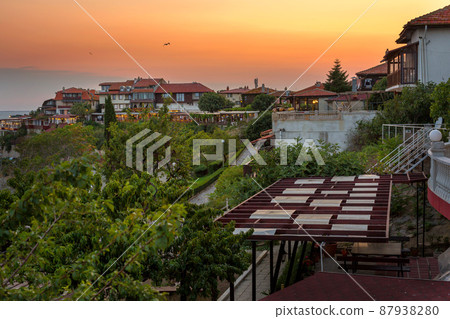 Pomorie, Bulgaria coastline, houses at sunset Pomorie, Bulgaria coastline, houses at sunset 87938280