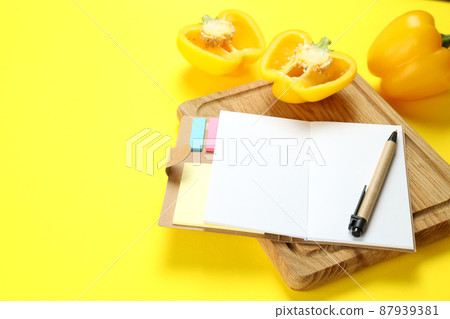 Concept of recipe on yellow background, space for text Concept of recipe on yellow background, space for text 87939381