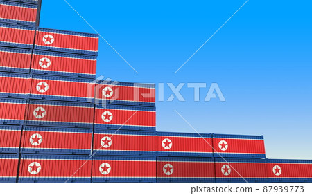 Flag of North Korea on containers forming declining trend of graph. National crisis or meltdown related conceptual 3D rendering Flag of North Korea on containers forming declining trend of graph. National crisis or meltdown related conceptual 3D rendering 87939773