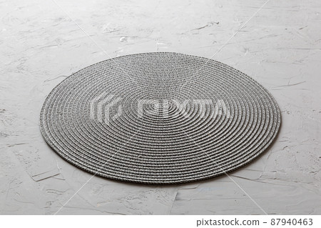 Perspective view of round tablecloth for food on cement background. Empty space for your design Perspective view of round tablecloth for food on cement background. Empty space for your design 87940463