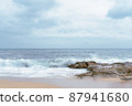 High Tides Coming on to the Rocky Shores of Costa Brava in Spain, cloudy weather 87941680