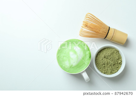 Matcha latte and accessories for making on white background 87942670