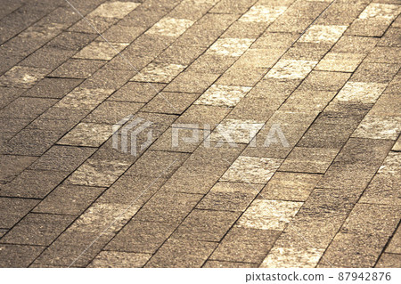the pavement close up in the sunlight 87942876
