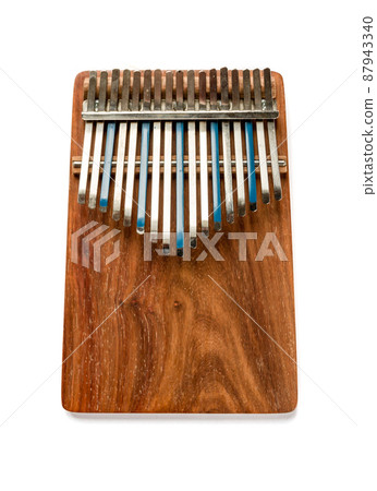 Traditional wooden kalimba isolated on white Traditional wooden kalimba isolated on white 87943340