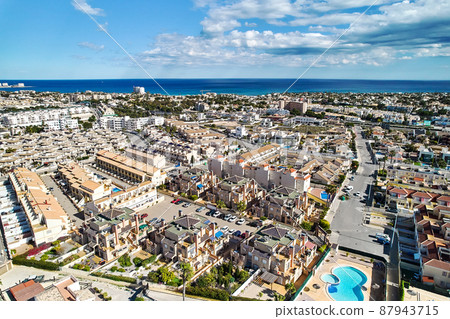 Residential district townscape rooftops of Cabo Roig 87943715