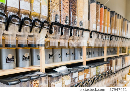 Organic cereals and grains in sustainable plastic free grocery store Organic cereals and grains in sustainable plastic free grocery store 87947451