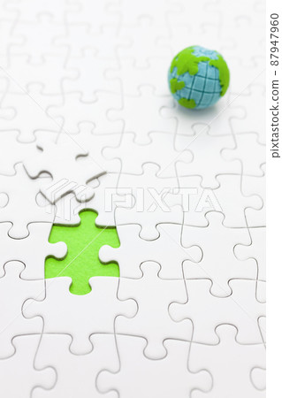 Jigsaw puzzle and the globe Jigsaw puzzle and the globe 87947960
