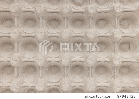 Cardboard for 30 pack of large eggs. Closeup, abstract background Cardboard for 30 pack of large eggs. Closeup, abstract background 87948425