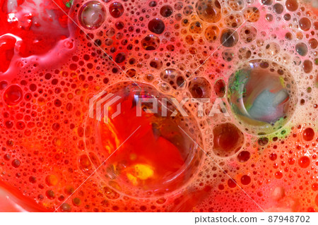Texture pattern of soap bubbles on a red background. Texture pattern of soap bubbles on a red background. 87948702