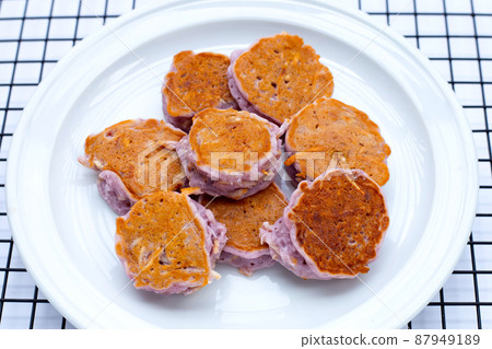 Coconut pancake on white background. Coconut pancake on white background. 87949189