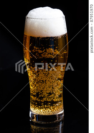 Beer poured into a glass 87951970