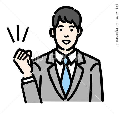 Bust up of a young man in a suit who makes a guts pose with a smile 87952151