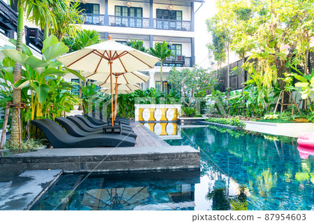 umbrella and bed pool chair around swimming pool umbrella and bed pool chair around swimming pool 87954603