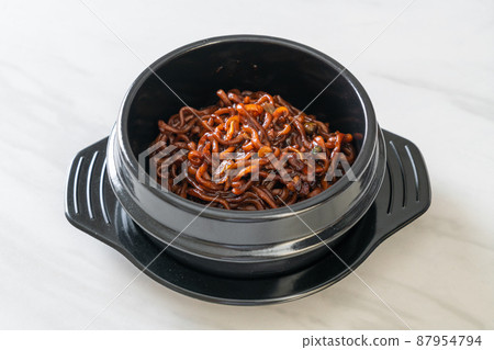 Korean black spaghetti or instant noodle with roasted chajung sauce Korean black spaghetti or instant noodle with roasted chajung sauce 87954794