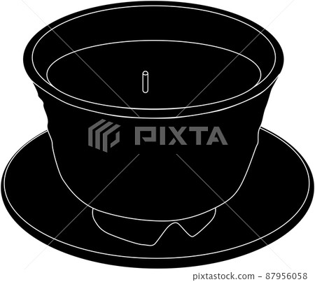A teacup and a tea pillar "silhouette" on the plate 87956058