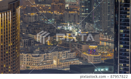Aerial view to traditional houses of old town island night timelapse from above. Aerial view to traditional houses of old town island night timelapse from above. 87957822