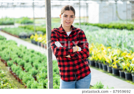 Portrait of a confident young woman farmer 87959692