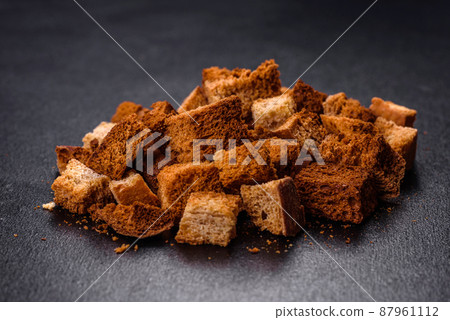 Breadcrumbs cut into cubes are perfect for soup, salad Breadcrumbs cut into cubes are perfect for soup, salad 87961112