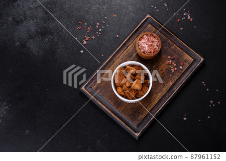 Breadcrumbs cut into cubes are perfect for soup, salad Breadcrumbs cut into cubes are perfect for soup, salad 87961152