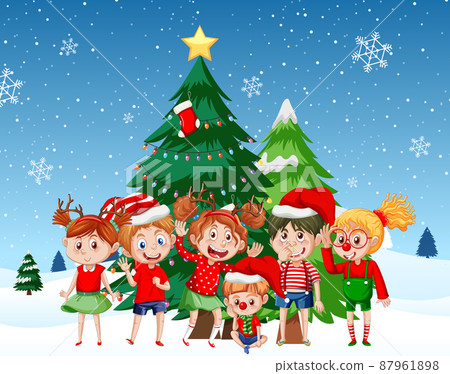 Children in Christmas costumes with Christmas tree 87961898