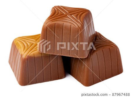 Chocolate sweets on a white background 87967488