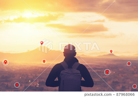 Backpacker man standing at top of mountain looking view landscape with navigator gps location abstract background. Copy space travel adventure holiday and technology business concept. Backpacker man standing at top of mountain looking view landscape with navigator gps location abstract background. Copy space travel adventure holiday and technology business concept. 87968066