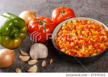 Sofrito base sauce from fresh vegetables close-up in a bowl. horizontal Sofrito base sauce from fresh vegetables close-up in a bowl. horizontal 87970303