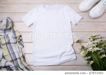 Womens T-shirt mockup with wild daisy 87972491