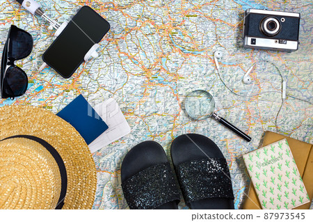 Travel plan, trip vacation accessories for trip, tourism mockup - Outfit of traveler on map background. Flat lay and copyspace. Travel plan, trip vacation accessories for trip, tourism mockup - Outfit of traveler on map background. Flat lay and copyspace. 87973545