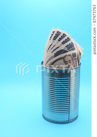10,000-yen and 1,000-yen bills in empty cans 87973763