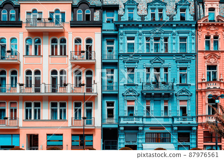 Colorful facades of old baroque buildings Colorful facades of old baroque buildings 87976561